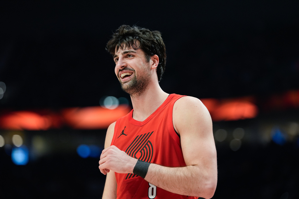 Portland Trail Blazers forward Deni Avdija reacts during the first half of an NBA basketball game against the Washington Wizards, Sunday, March 29, 2026, in Portland, Ore. (AP Photo/Jenny Kane)