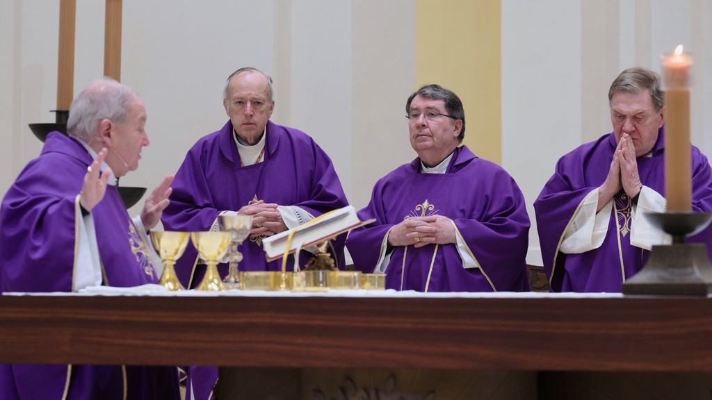 Archbishop Bernard Hebda, and Cardinals Robert McElroy, Christophe Pierre and Joseph Tobin celebrate a mass in solidarity with migrants at the Chapel of St. Thomas Aquinas on Friday, Feb. 27, 2026 in St. Paul, Minn. (AP Photo/Mark Vancleave)