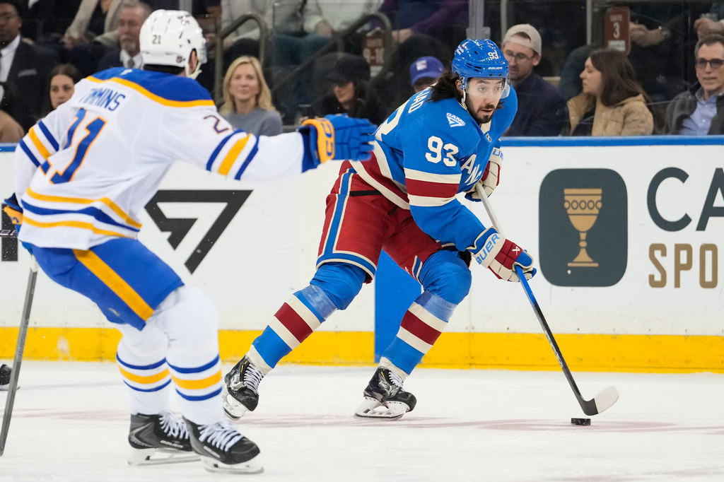 New York Rangers center Mika Zibanejad (93) looks to pass during the first period of an NHL hockey game against Buffalo Sabres, Wednesday, April 8, 2026, in New York. (AP Photo/Yuki Iwamura)
