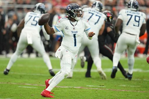 Tennessee Titans quarterback Cam Ward (1) looks to throw a pass during the second half of an NFL football game against the Arizona Cardinals, Sunday, Oct. 5, 2025, in Glendale, Ariz. (AP Photo/Rick Scuteri) Tennessee Titans quarterback Cam Ward (1) looks to throw a pass during the second half of an NFL football game against the Arizona Cardinals, Sunday, Oct. 5, 2025, in Glendale, Ariz. (AP Photo/Rick Scuteri)