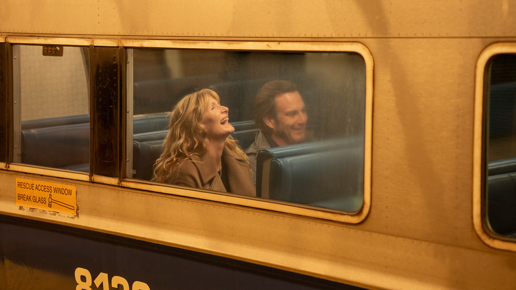 This image released by Searchlight Pictures shows Laura Dern, left, and Will Arnett in a scene from "Is This Thing On?" (Jason McDonald/Searchlight Pictures via AP)