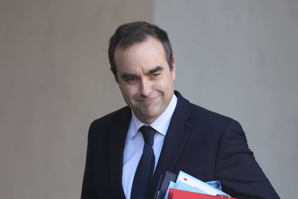 FILE - French Defense Minister Sebastien Lecornu leaves the first cabinet meeting of the new government, at the Elysee Palace in Paris, Friday, Jan. 3, 2025. (AP Photo/Thomas Padilla, File)