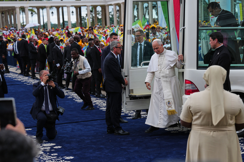 Pope Leo XIV arrives at the Basilica of the Immaculate Conception on the 10th day of his 11-day pastoral visit to Africa, in Mongomo, Equatorial Guinea, Wednesday, April 22, 2026. (AP Photo/Misper Apawu)