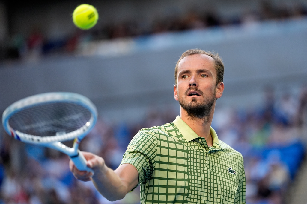 Daniil Medvedev of Russia plays prepares to serve to Learner Tien of the U.S. during their fourth round match at the Australian Open tennis championship in Melbourne, Australia, Sunday, Jan. 25, 2026. (AP Photo/Asanka Brendon Ratnayake)