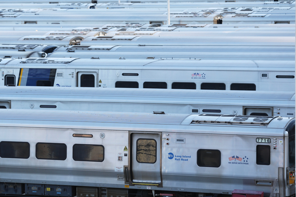 Long Island Rail Road trains sit in the West Side Yard on the first day of a strike, Saturday, May 16, 2026, in New York. (AP Photo/Heather Khalifa)