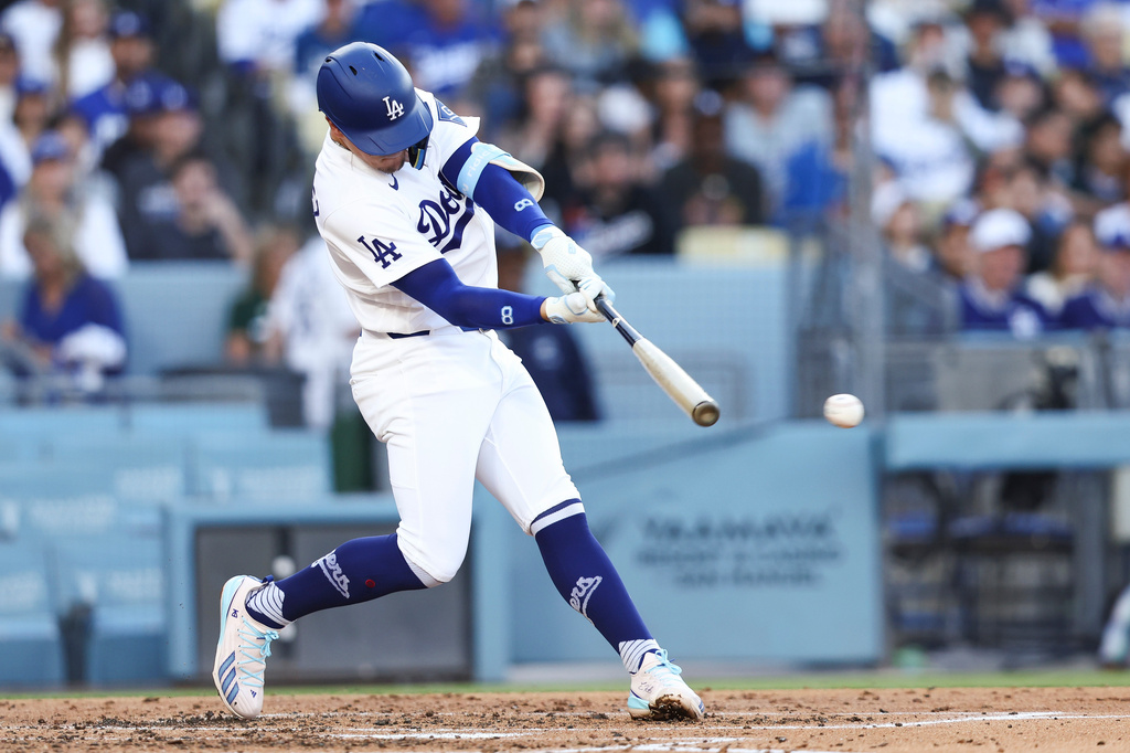 Los Angeles Dodgers' Enrique Hernández hits an RBI double during the third inning of a baseball game against the Colorado Rockies, Monday, May 25, 2026, in Los Angeles. (AP Photo/Jessie Alcheh)