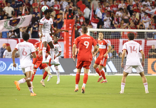 Toronto FC forward Deandre Kerr, top left, heads the ball during the first half of an MLS soccer match against the Chicago Fire, Saturday, Oct. 4, 2025, in Chicago. (AP Photo/Talia Sprague) Toronto FC forward Deandre Kerr, top left, heads the ball during the first half of an MLS soccer match against the Chicago Fire, Saturday, Oct. 4, 2025, in Chicago. (AP Photo/Talia Sprague)
