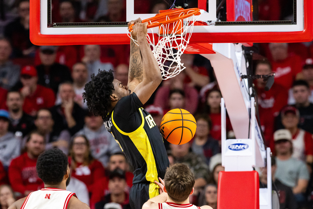 Oregon guard Takai Simpkins (5) dunks the ball against Nebraska during the first half of an NCAA college basketball game, Tuesday, Jan. 13, 2026, in Lincoln, Neb. (AP Photo/Bonnie Ryan)