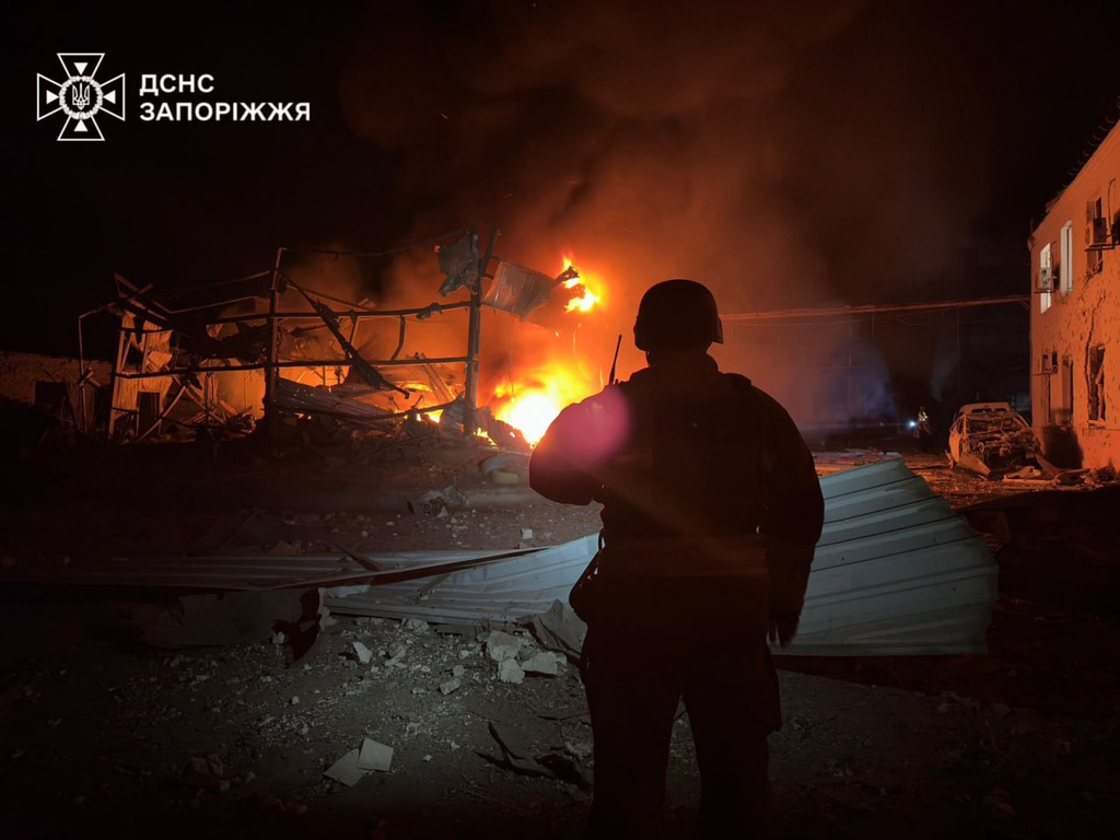 In this photo provided by the Ukrainian Emergency Service, fire and smoke are seen after a residential building was damaged during a Russia's air strike in Zaporizhzhia, Ukraine, Sunday, Oct. 5, 2025. (Ukrainian Emergency Service via AP)