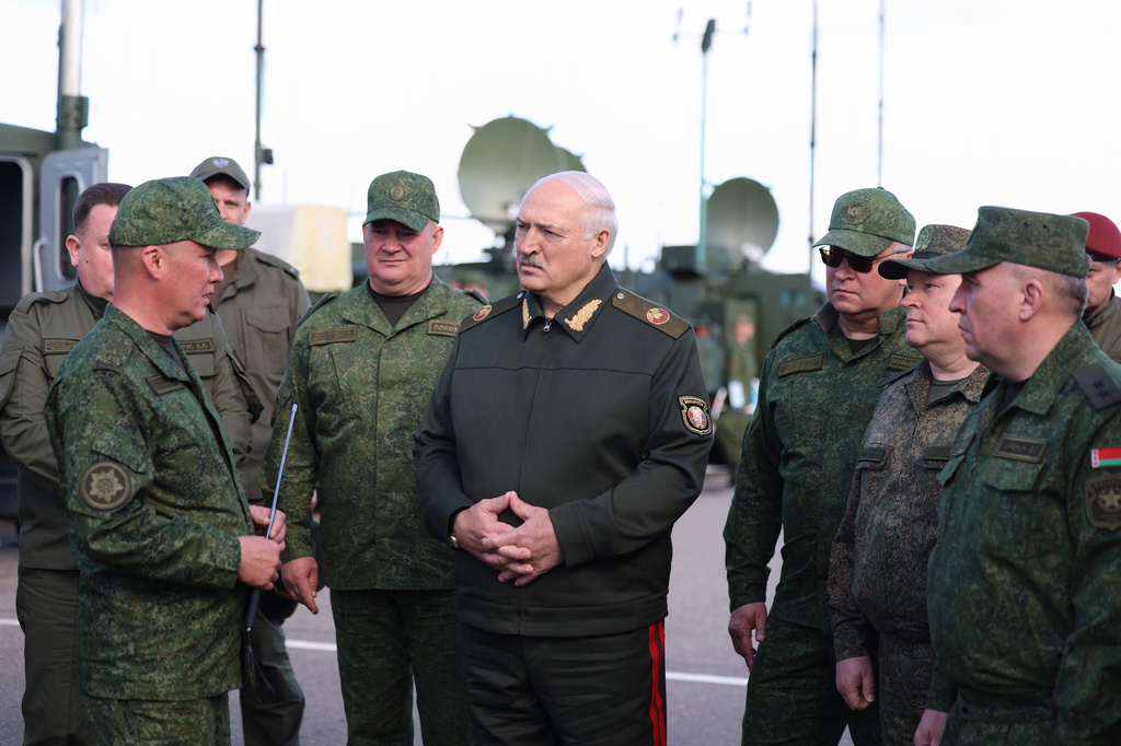In this photo, released by Belarusian Presidential Press Service, Belarusian President Alexander Lukashenko, center, visits the Obuz-Lesnovsky combined-arms training ground, Belarus, on Friday, Sept. 11, 2026. (Belarusian Presidential Press Service via AP)