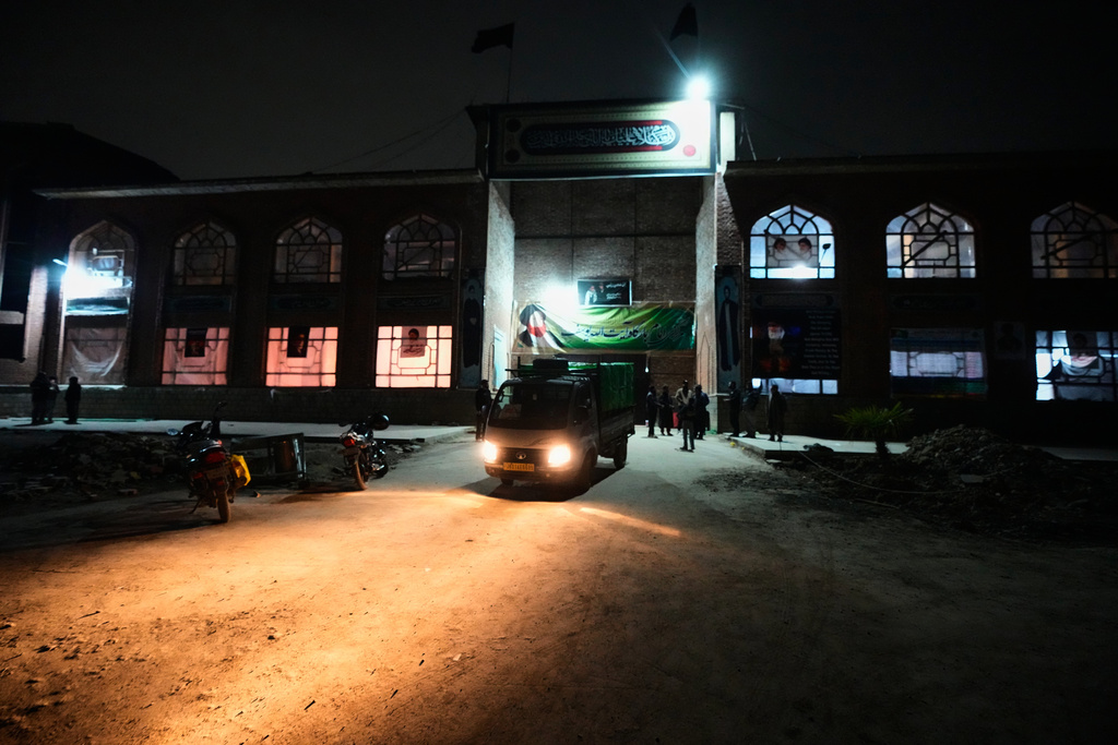 A vehicle loaded with donated goods departs at the conclusion of a relief drive for Iran in Budgam, Indian-controlled Kashmir, Monday, March 23, 2026. (AP Photo/Mukhtar Khan)