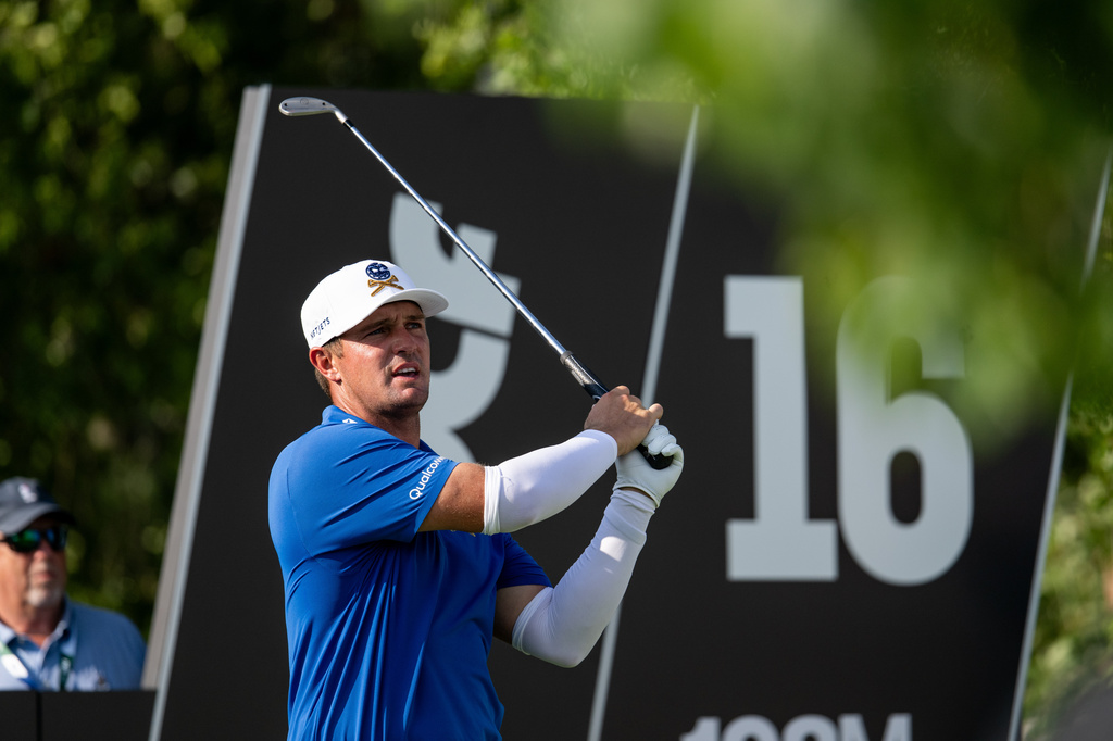 Captain Bryson DeChambeau, of Crushers GC, hits from the 16th tee during the first round of LIV Golf Bedminster at Trump National Golf Club, Thursday, Aug. 6, 2026, in Bedminster, N.J. (Montana Pritchard/LIV Golf via AP)