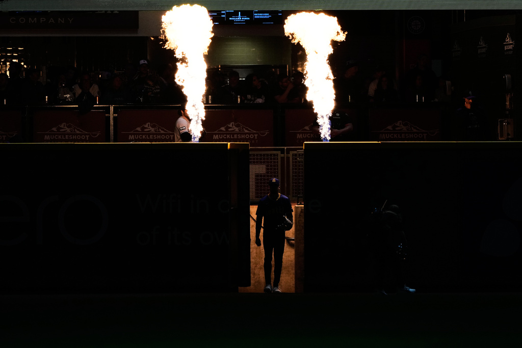 Seattle Mariners relief pitcher Matt Brash takes the field during the eighth inning of a baseball game against the Colorado Rockies, Thursday, Sept. 25, 2025, in Seattle. (AP Photo/Ryan Sun)