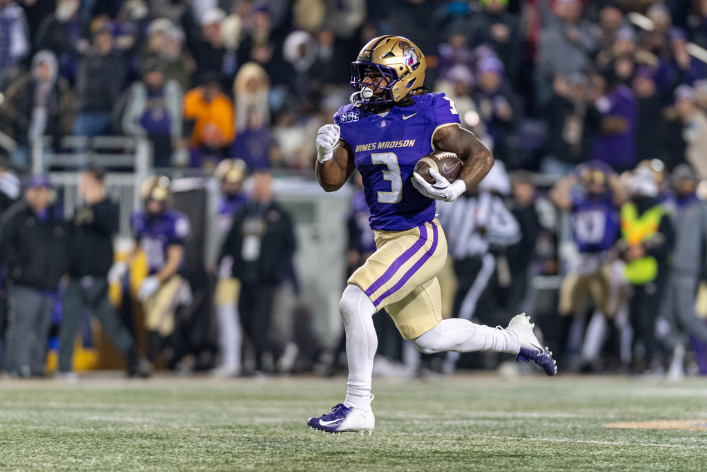 James Madison running back Wayne Knight (3) runs the ball for a touchdown against Troy during the first half of the Sun Belt Championship NCAA college football game, Friday, Dec. 5, 2025, in Harrisonburg, Va. (AP Photo/Robert Simmons)