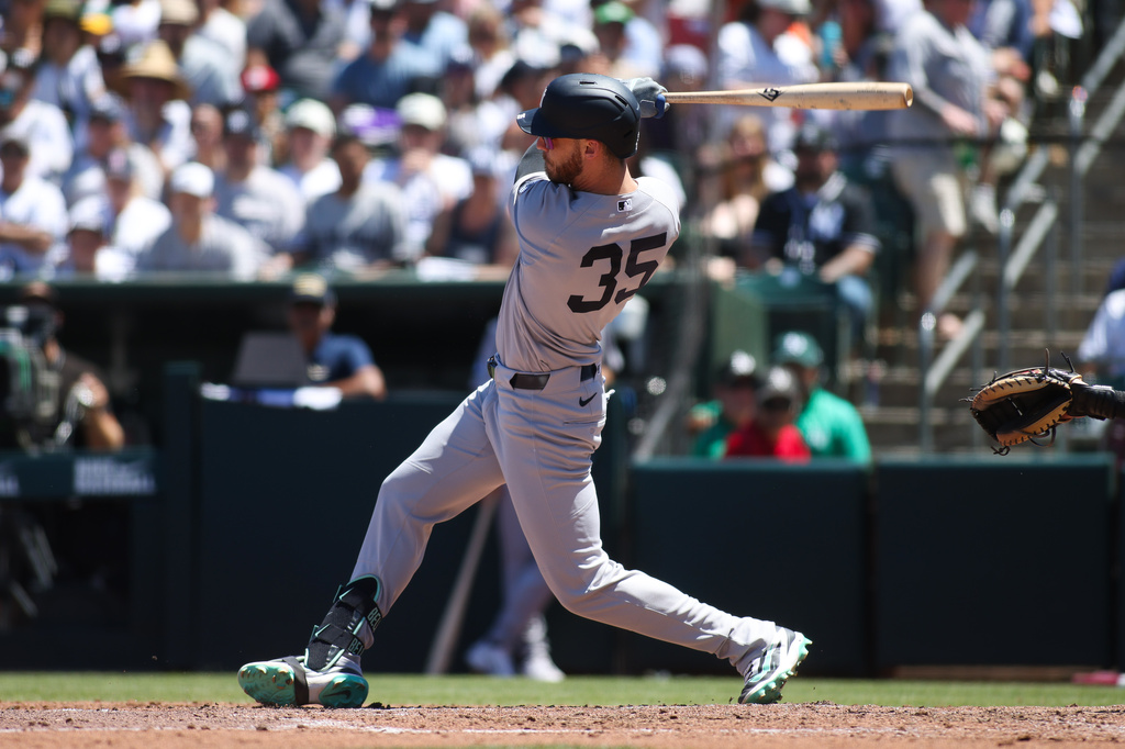 New York Yankees' Cody Bellinger hits an RBI single during the third inning of a baseball game against the Athletics, Sunday, May 31, 2026, in West Sacramento, Calif. (AP Photo/Scott Marshall)