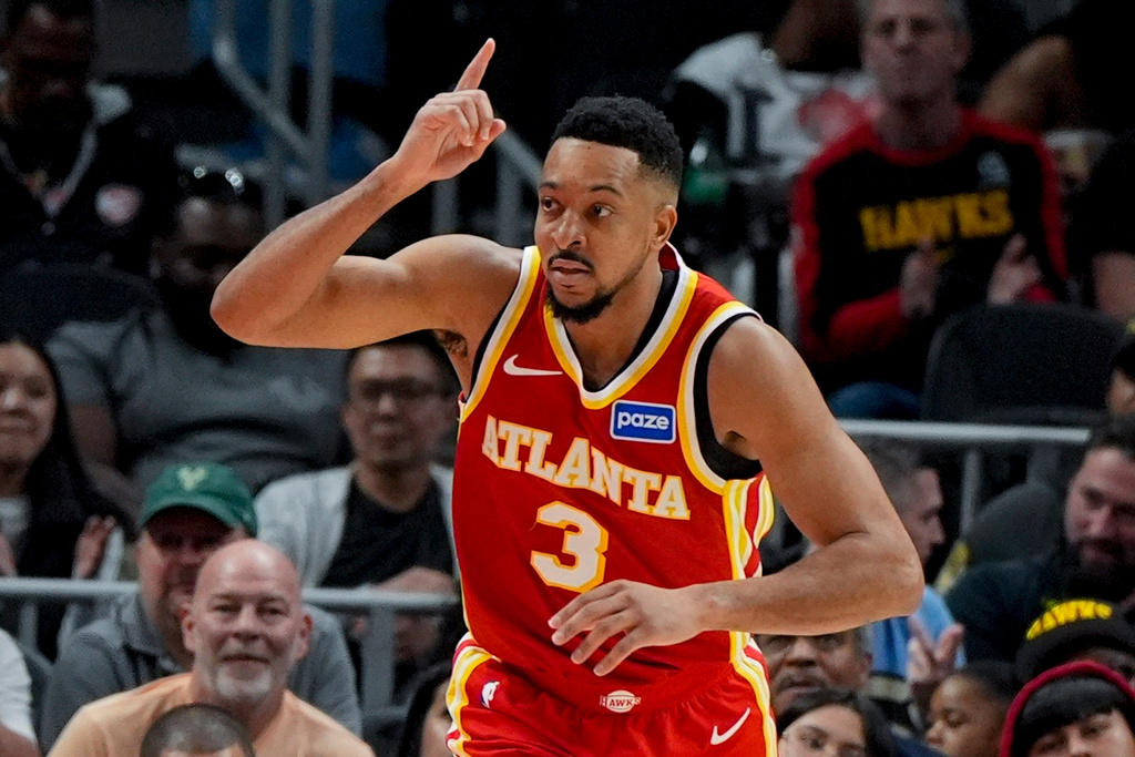 Atlanta Hawks guard CJ McCollum (3) celebrates a basket against the Milwaukee Bucks during the second half of an NBA basketball game, Saturday, March 14, 2026, in Atlanta. (AP Photo/Mike Stewart)