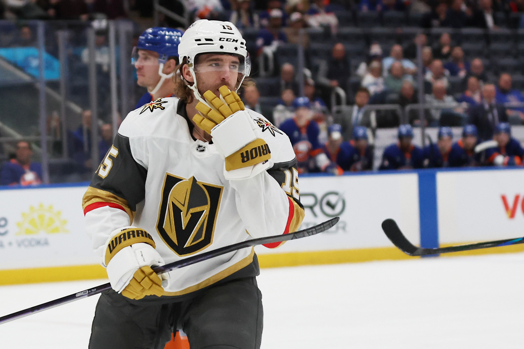Vegas Golden Knights' Noah Hanifin (15) gestures after scoring against the New York Islanders during the first period of an NHL hockey game, Tuesday, Dec. 9, 2025, in Elmont, N.Y. (AP Photo/Heather Khalifa)