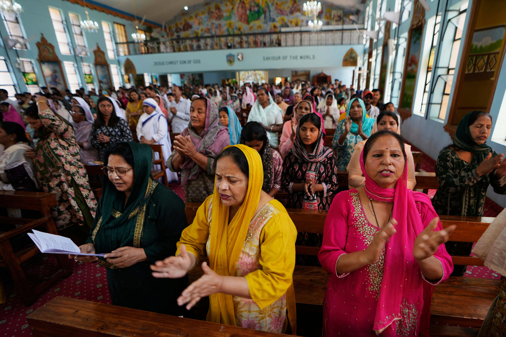 Indian Christian devotees offer prayers at a church on Easter Sunday in Jammu, India, Sunday, April 5, 2026.(AP Photo/Channi Anand)