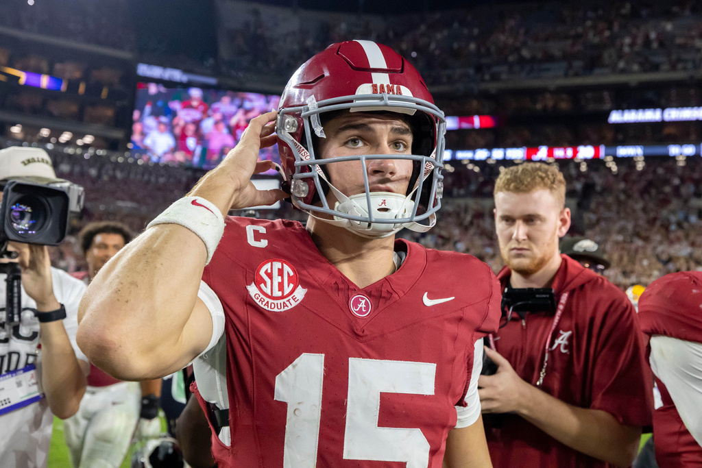 Alabama quarterback Ty Simpson (15) walks the field after a win over LSU at an NCAA college football game, Saturday, Nov. 8, 2025, in Tuscaloosa, Ala. (AP Photo/Vasha Hunt)