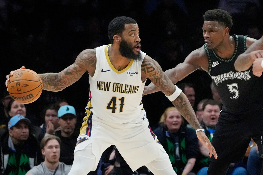 New Orleans Pelicans forward Saddiq Bey (41) works around Minnesota Timberwolves guard Anthony Edwards (5) in the first quarter of an NBA basketball game Friday, Feb. 6, 2026, in Minneapolis. (AP Photo/Bruce Kluckhohn)
