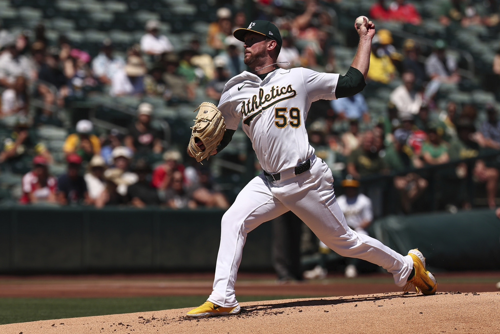 Athletics pitcher Jeffrey Springs throws to the Los Angeles Angels during the first inning of a baseball game, Sunday, Aug. 17, 2025, in West Sacramento, Calif. (AP Photo/Sara Nevis)