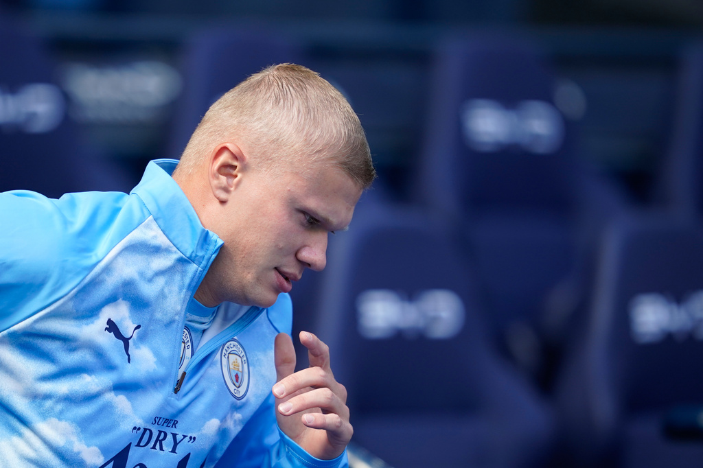 Manchester City's Erling Haaland warms up prior to the English Premier League soccer match between Manchester City and Bournemouth in Manchester, England, Sunday, Aug. 23, 2026. (AP Photo/Dave Thompson)