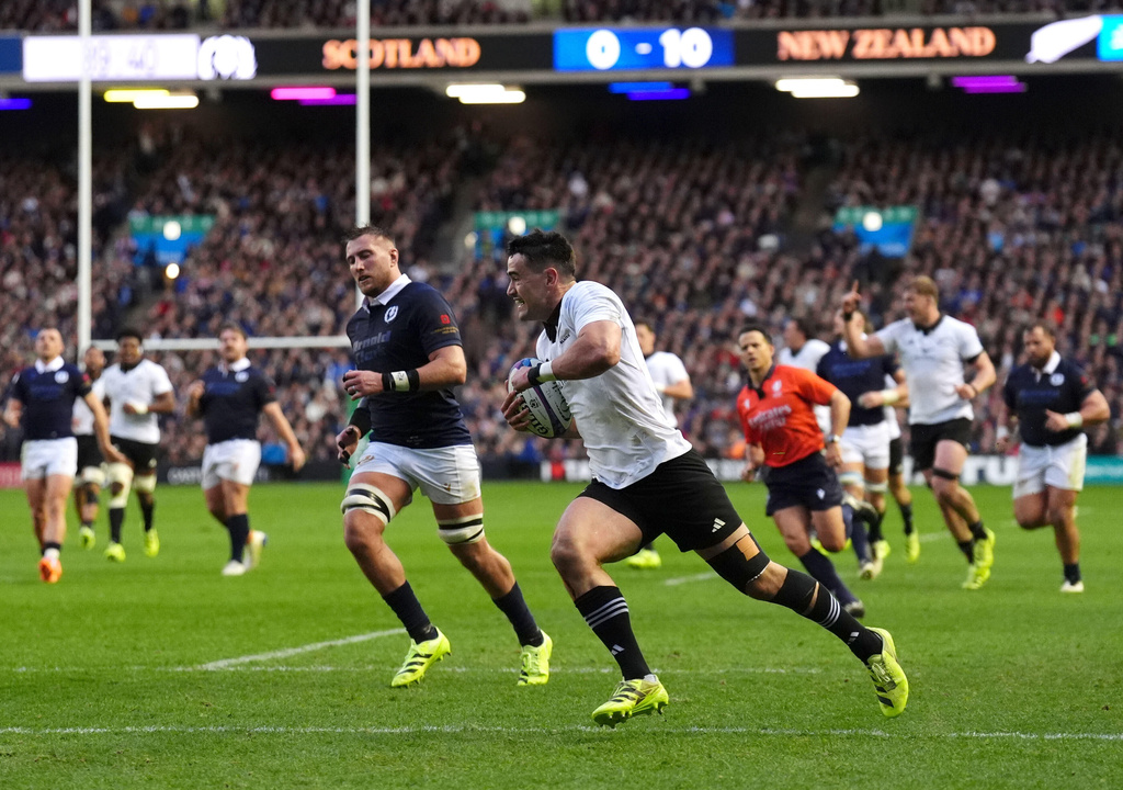 New Zealand's Will Jordan scores their side's second try during Rugby Union Autumn Series match between Scotland and New Zealand in Edinburgh, Scotland, Saturday, Nov. 8, 2025. (Andrew Milligan/PA via AP)