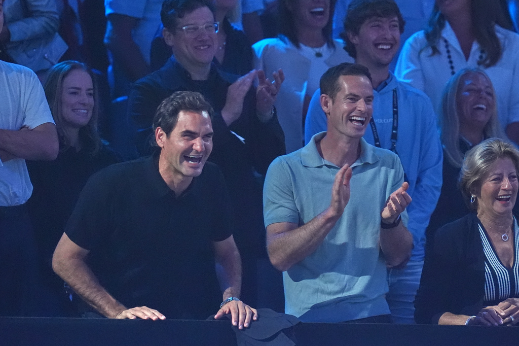 Former tennis stars Roger Federer, left, and Andy Murray laugh inbetween matches Laver Cup tennis tournament match in London, Saturday, Sept. 26, 2026. (AP Photo/Maja Smiejkowska)