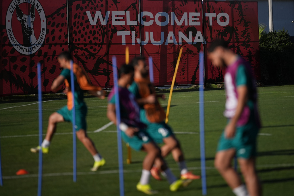Players for Iran participate in a training session ahead of their team's World Cup Group G soccer match against Belgium Tuesday, June 16, 2026, in Tijuana, Mexico. (AP Photo/Gregory Bull)