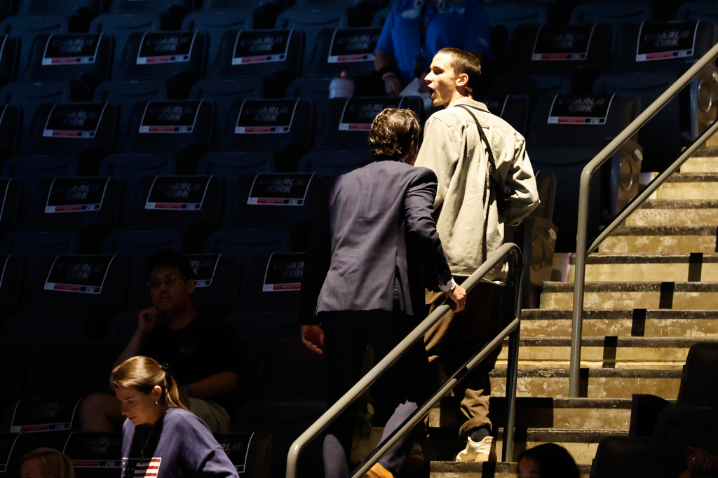 A protester is removed as Vice President JD Vance speaks at a Turning Point USA tour stop at the University of Georgia in Athens, Ga., Tuesday, April 14, 2026. (AP Photo/Erik S. Lesser)