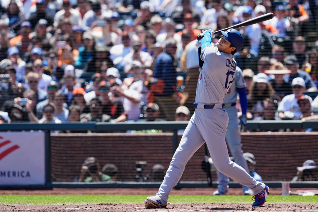 Los Angeles Dodgers' Shohei Ohtani (17) strikes out swinging during the third inning of a baseball game against the San Francisco Giants, Thursday, April 23, 2026, in San Francisco. (AP Photo/Godofredo A. Vásquez)