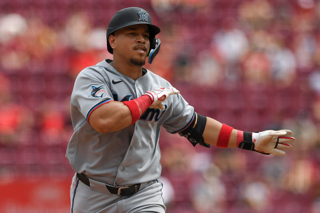 Miami Marlins' Heriberto Hernández rounds the bases after hitting a solo home run during the eighth inning of a baseball game against the Cincinnati Reds, Sunday, Aug. 16, 2026, in Cincinnati. (AP Photo/Tanner Pearson)