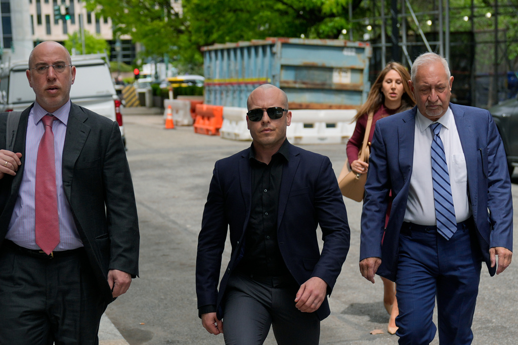 Gannon Ken Van Dyke walks with his attorneys near a federal court building in New York on Tuesday, April 28, 2026. (AP Photo/Seth Wenig)