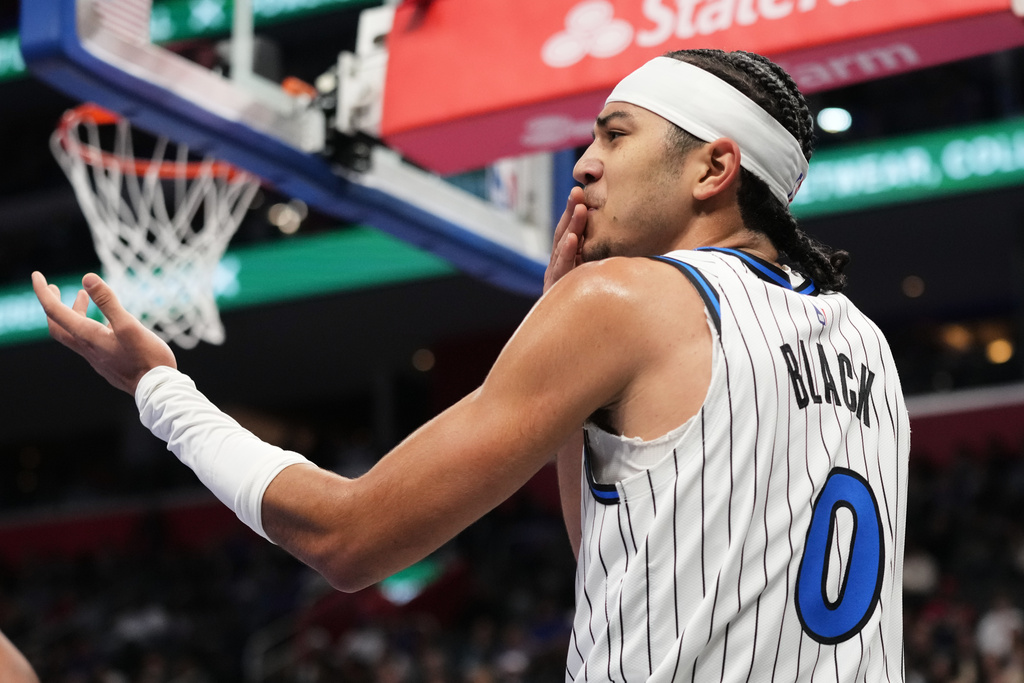 Orlando Magic guard Anthony Black reacts during the first half of an NBA Cup basketball game against the Detroit Pistons, Friday, Nov. 28, 2025, in Detroit. (AP Photo/Ryan Sun)