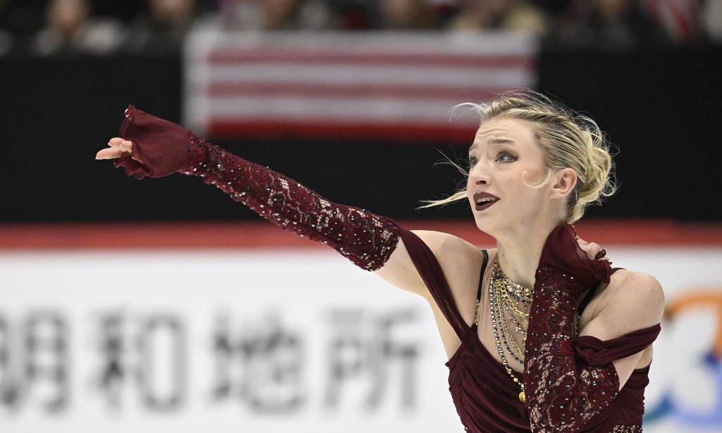 Amber Glenn of the U.S. performs in the Women's Short Program during the figure skating ISU Grand Prix competition in Helsinki, Finland, Friday Nov. 21, 2025. (Heikki Saukkomaa/Lehtikuva via AP)