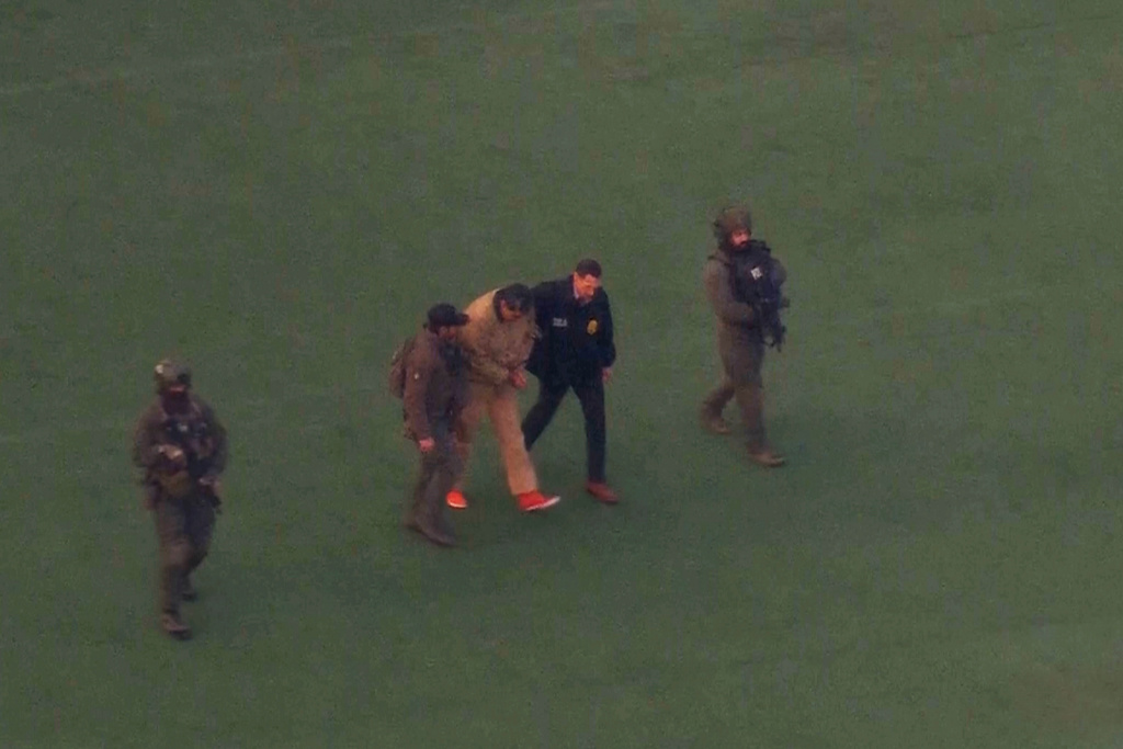 This image taken from video shows Venezuelan President Nicolas Maduro being escorted to board a helicopter for transport to Manhattan Federal Court, Monday, Jan. 5, 2026, in New York. (WABC via AP)