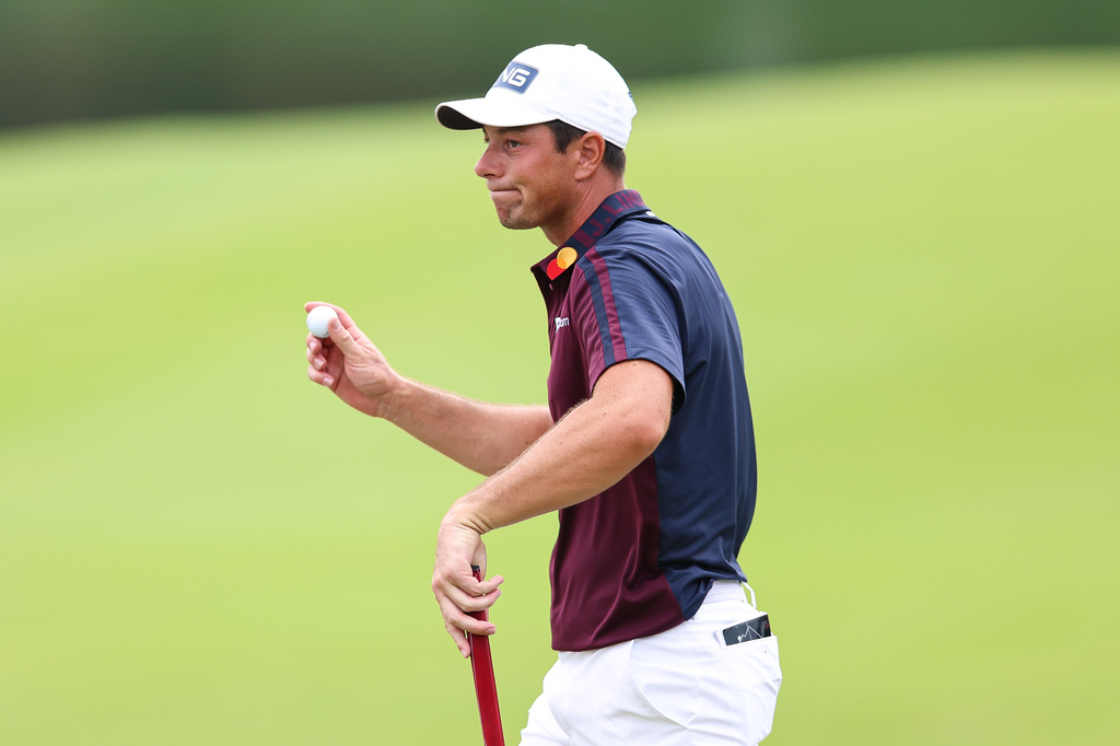 Viktor Hovland, of Norway, reacts on the 18th hole during the second round of the Tour Championship golf tournament, Friday, Aug. 28, 2026, in Atlanta. (AP Photo/Colin Hubbard)