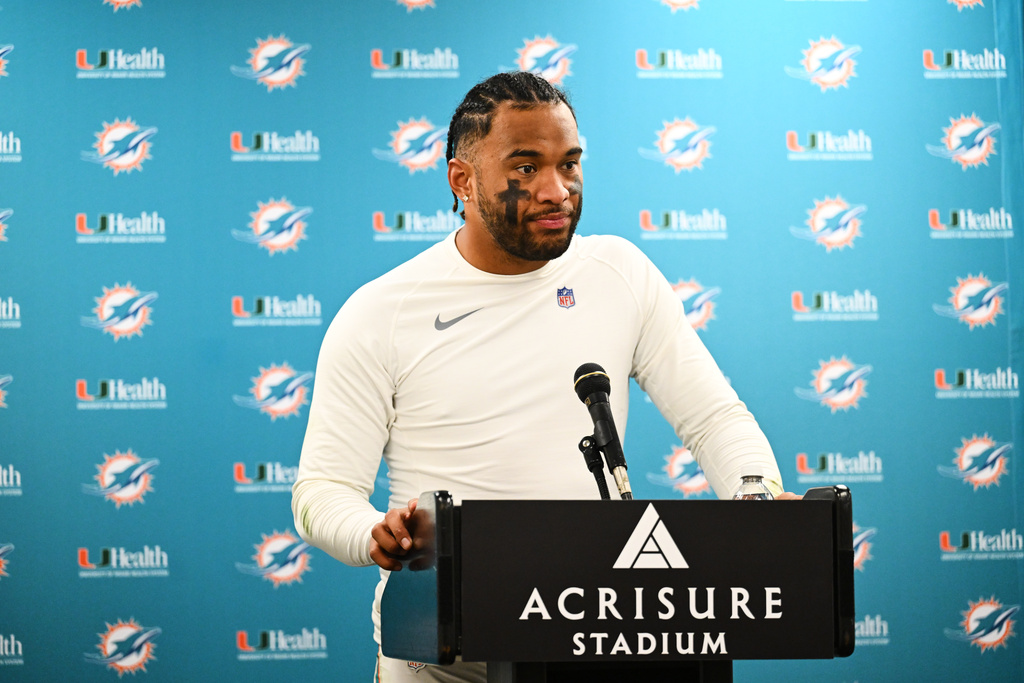 Miami Dolphins quarterback Tua Tagovailoa responds to a question during a news conference after an NFL football game against the Pittsburgh Steelers in Pittsburgh, Monday, Dec. 15, 2025. (AP Photo/Justin Berl)