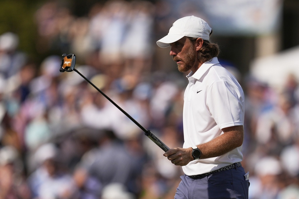 Tommy Fleetwood, of England, walks on the 18th green during the final round of the St. Jude Championship golf tournament Sunday, Aug. 10, 2025, in Memphis, Tenn. (AP Photo/George Walker IV)