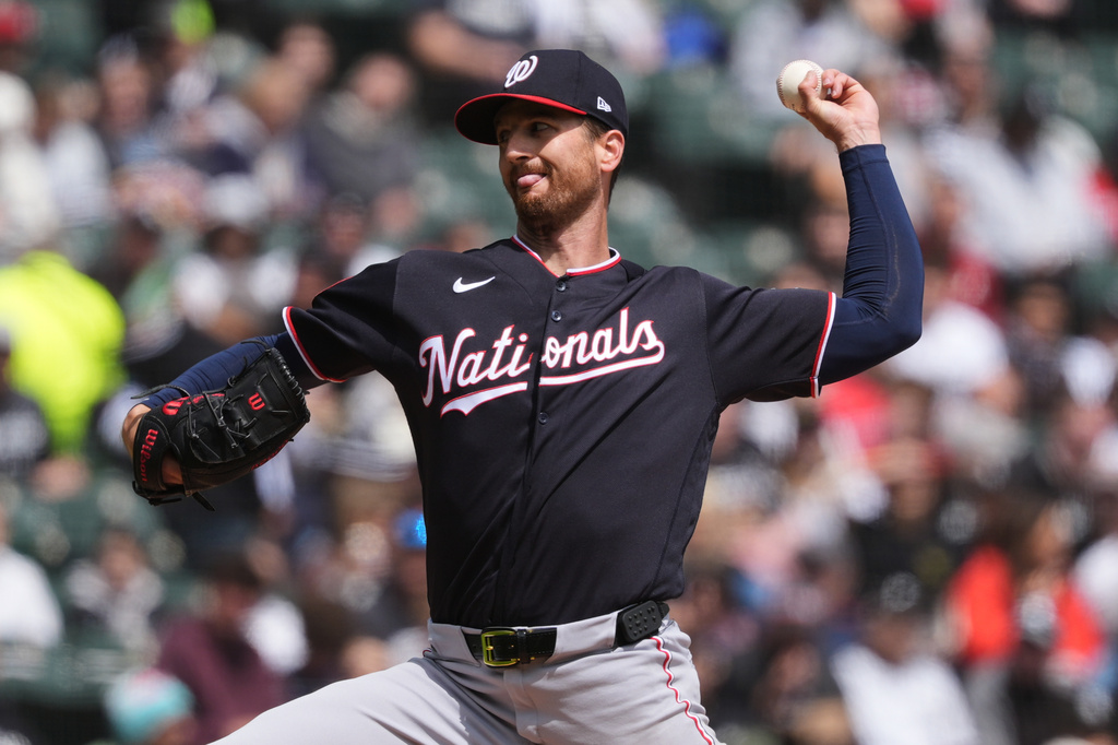 Washington Nationals starting pitcher Foster Griffin throws against the Chicago White Sox during the first inning of a baseball game in Chicago, Sunday, April 26, 2026. (AP Photo/Nam Y. Huh)
