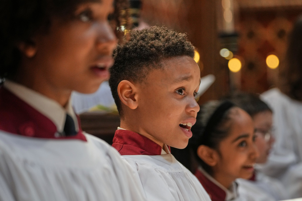 Britain Choral Music Choristers sing during Evensong at Rochester Cathedral in Rochester, England, Friday, March 27, 2026. (AP Photo/Kin Cheung)