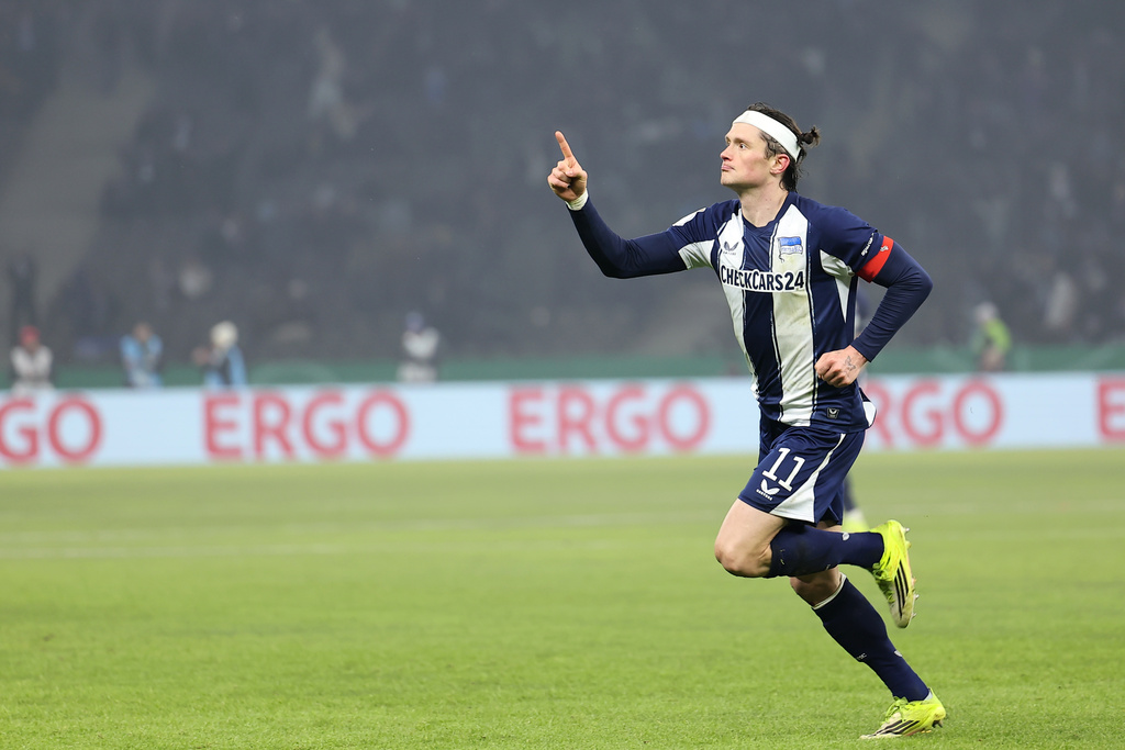 Hertha Berlins' Fabian Reese celebrates after scoring a goal during the German Cup quarterfinal soccer match between Hertha Berlin and SC Freiburg in Berlin, Tuesday, Feb. 10, 2026. (Andreas Gora/dpa via AP)