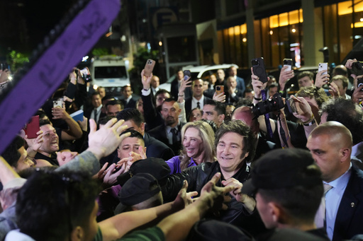 Argentina's President Javier Milei greets supporters after winning in legislative midterm elections in Buenos Aires, Argentina, Sunday, Oct. 26, 2025. (AP Photo/Rodrigo Abd) Argentina's President Javier Milei greets supporters after winning in legislative midterm elections in Buenos Aires, Argentina, Sunday, Oct. 26, 2025. (AP Photo/Rodrigo Abd)
