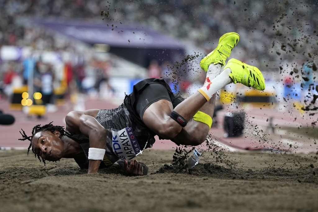 Zimbabwe's Chengetayi Mapaya makes an attempt in the men's triple jump qualification at the World Athletics Championships in Tokyo, Wednesday, Sept. 17, 2025. (AP Photo/Matthias Schrader)