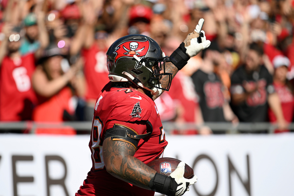 Tampa Bay Buccaneers offensive tackle Tristan Wirfs celebrates his touchdown catch against the Arizona Cardinals during the first half of an NFL football game Sunday, Nov. 30, 2025, in Tampa, Fla. (AP Photo/Jason Behnken)
