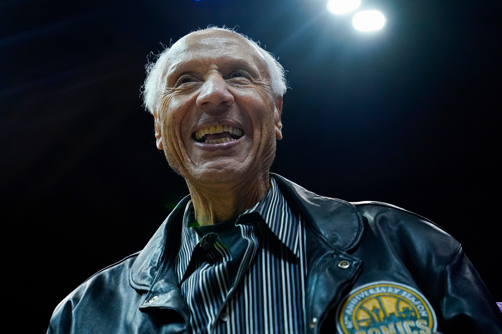 FILE - Former Seattle SuperSonics coach and player Lenny Wilkens acknowledges the crowd during the second half of a preseason NBA basketball game between the Los Angeles Clippers and the Utah Jazz, Oct. 10, 2023, in Seattle. (AP Photo/Lindsey Wasson, File)