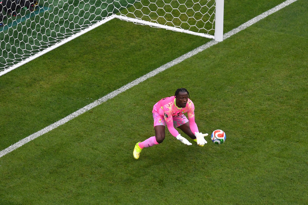 Ghana goalkeeper Benjamin Asare makes a save during the second half of the World Cup Group L soccer match between England and Ghana in Foxborough, Mass., near Boston, Tuesday, June 23, 2026. (AP Photo/Steven Senne)