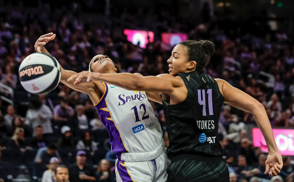 Valkyries's Kiah Stokes (41) blocks a shot by Sparks's Rae Burrell (12) in the second half of a WNBA basketball game Monday, June 15, 2026, in San Francisco. (Carlos Avila Gonzalez/San Francisco Chronicle via AP)