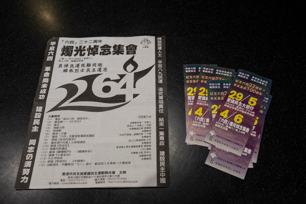 Pro-democracy activist Tang Ngok-kwan shows documents commemorating the Tiananmen crackdown in Hong Kong, Saturday, July 11, 2026. (AP Photo/Chan Long Hei)