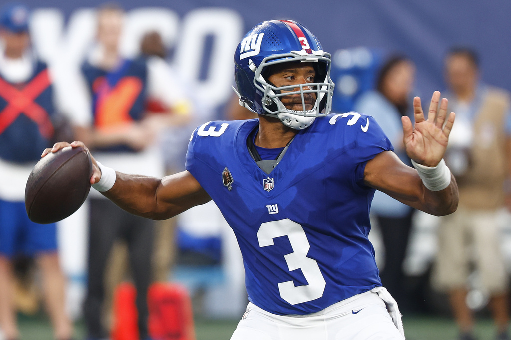 New York Giants quarterback Russell Wilson (3) passes the ball against the New York Jets during the first quarter of an NFL football game, Saturday, Aug. 16, 2025, in East Rutherford, N.J. (AP Photo/Noah K. Murray)
